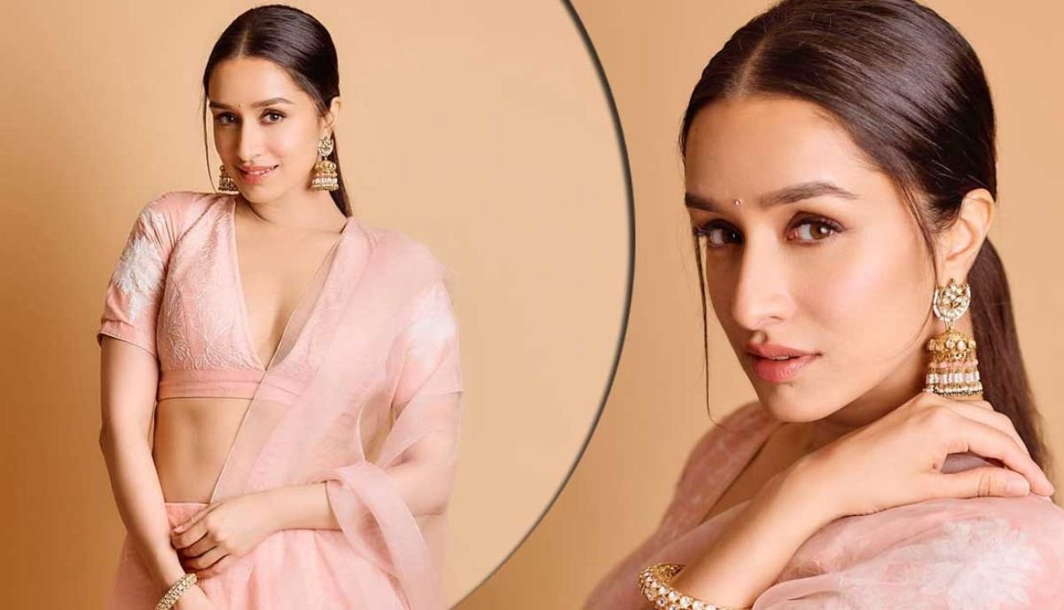 Wearing a blush-pink-toned lehenga with a beautiful plunging neckline and minimal embroidery, Shraddha Kapoor showed why you need to burn a cracker when you can just watch it